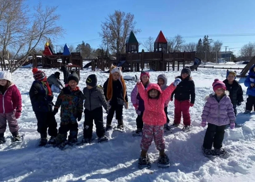 Kids snowshoeing